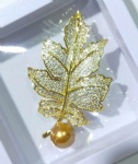Brass Leaf brooch with Ruby stone paved and cream pearl