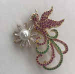 Alloy brooch with ruby, emeral clear cz and pearl in gold plating
